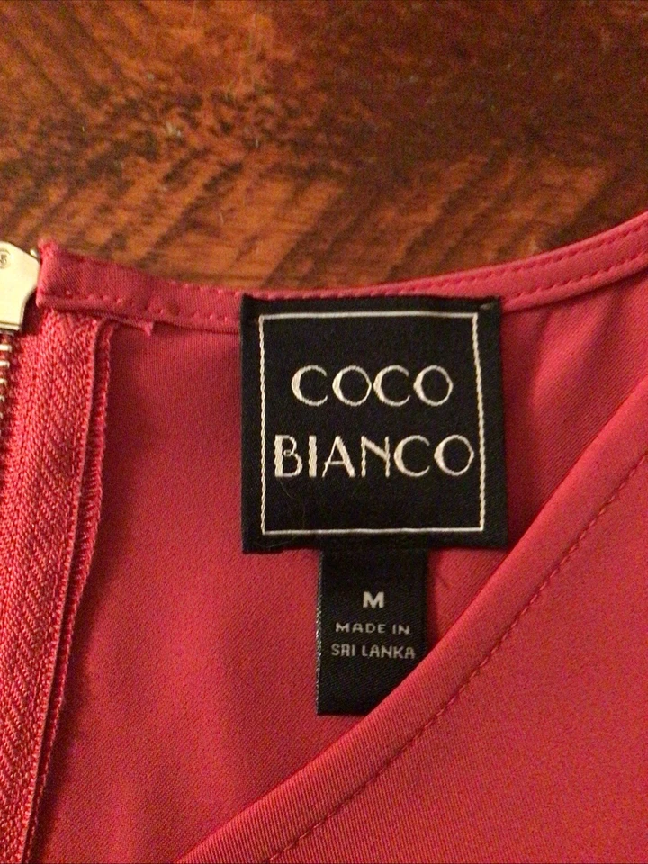 Blusa pulóver rosa manga corta Coco Bianca para mujer talla mediana cuello en V Foto 4 de 4