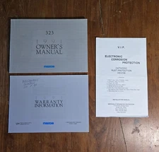 1991 Mazda 323 Owners Manual Guide Set With Case Factory Original OEM USED 