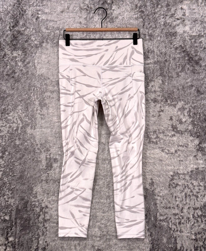 athleta salutation stash pocket ii 7/8 tight marble leggings