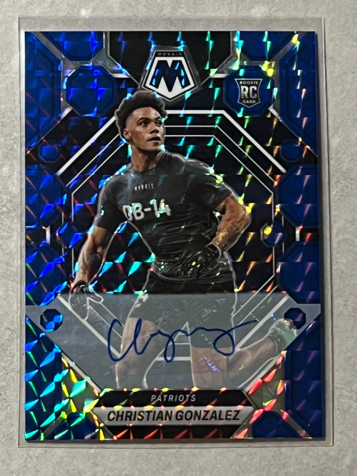 2023 Mosaic Christian Gonzalez Blue Prizm Rookie RC Auto /99 #300 Patriots