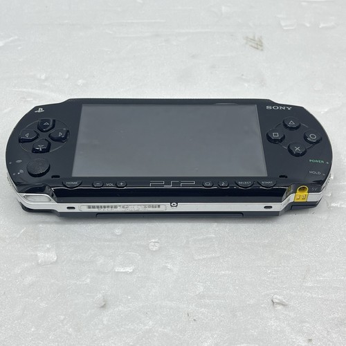 Sony PSP 1003 Console Tested Working w/ Genuine Charger, New Battery & 1 Game - Picture 5 of 19