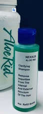 Nexxus (propylene glycol)Aloe Toxin Rid Shampoo, refilled into a 4 oz bottle.