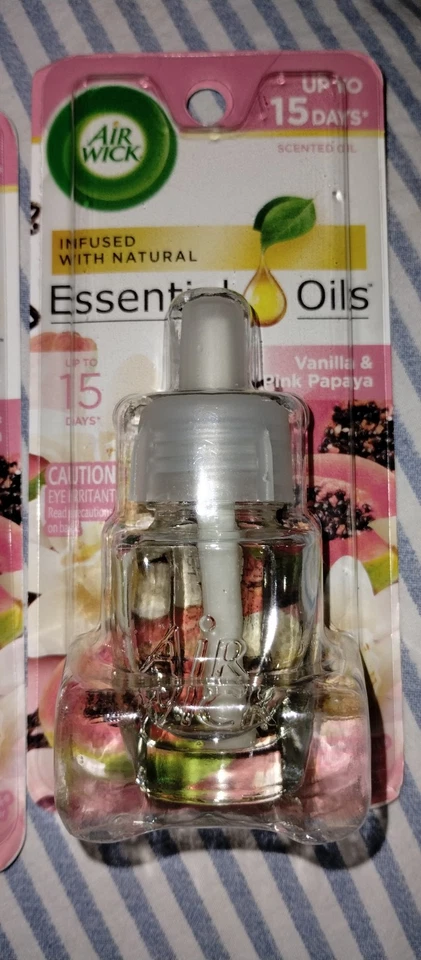 Juego de 3 Aceites Esenciales Perfumados Air Wick Vainilla y Papaya Infundidos Nuevo Lote Sellado  Foto 2 de 2