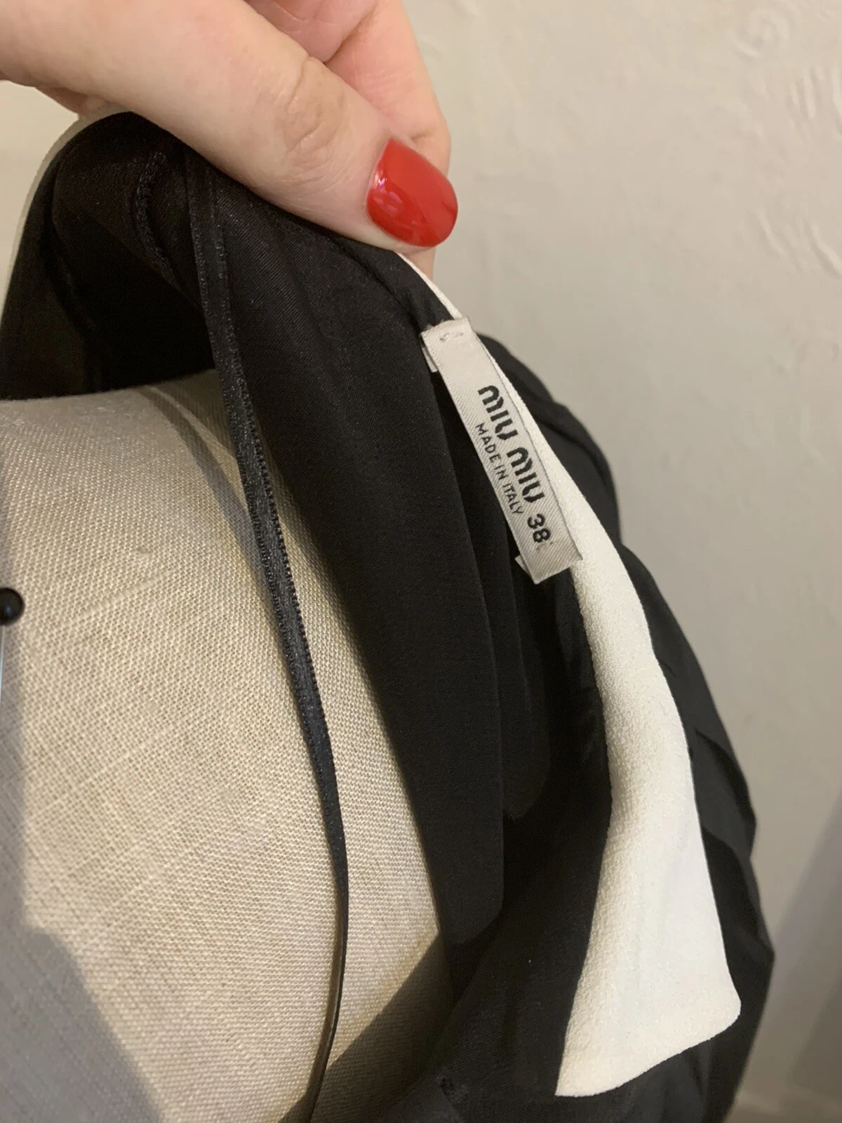 Mini abito plissettato in raso nero Miu Miu