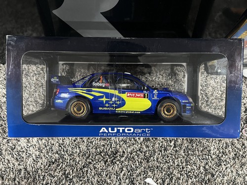 Autoart 1/18 Scale Diecast 80492 - Subaru Impreza WRC 2004 Solberg #1 Japan - Picture 2 of 5