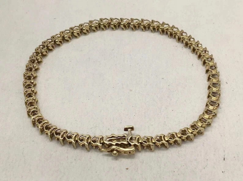 Brazalete de tenis redondo de diamantes de chocolate creado en laboratorio de 5 quilates enchapado en oro amarillo de 14 quilates Foto 3 de 4