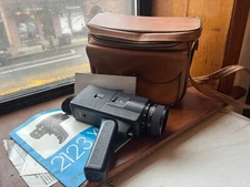 BELL & HOWELL 2123 XL SUPER 8 HANDHELD MOVIE CAMERA WITH BAG AND ORIGINAL MANUAL