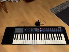 Casio CA-110 Keyboard mit Holz-Keyboardständer Schwarz Pulse Code