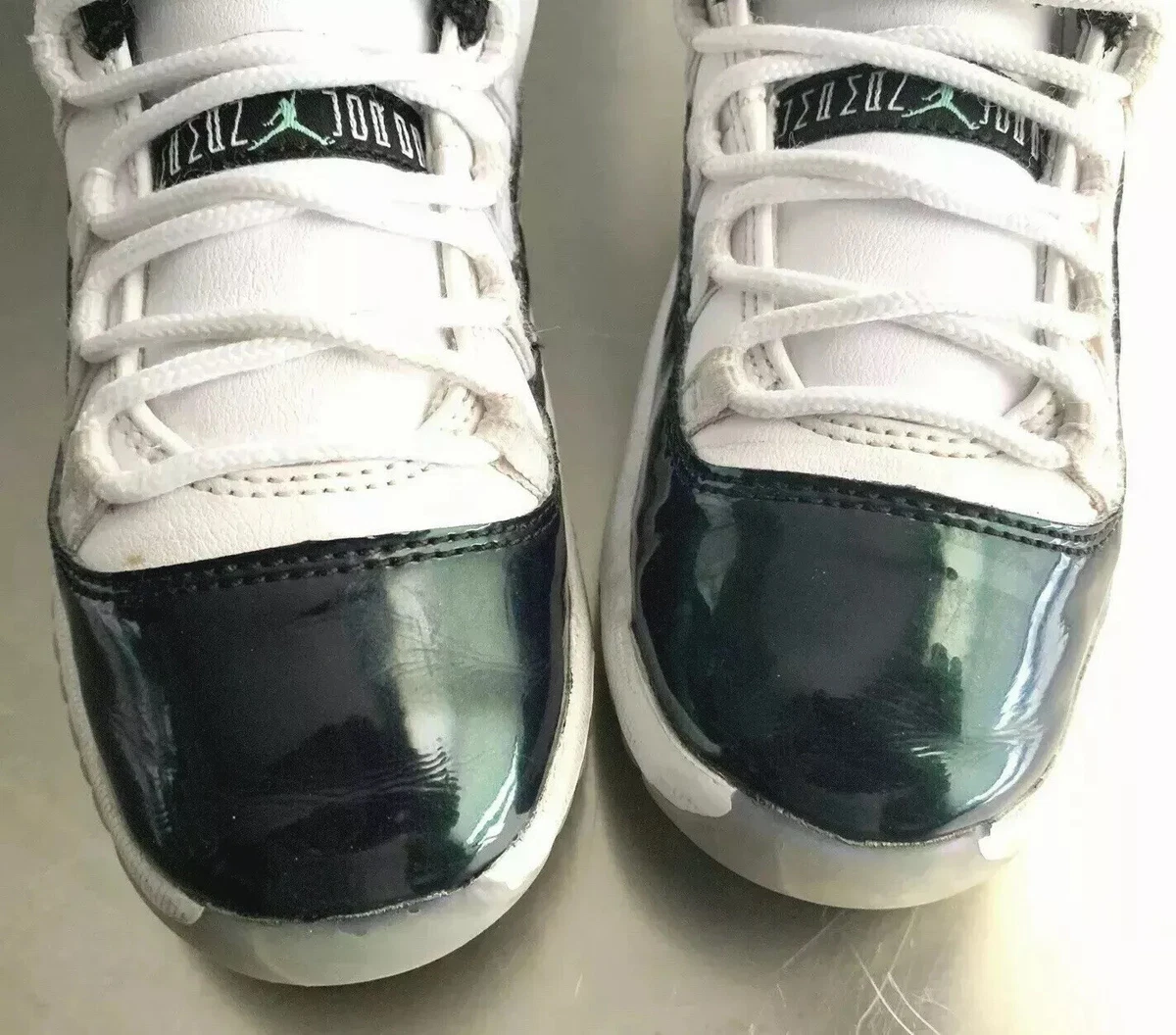 Green and white jordans 11 sale