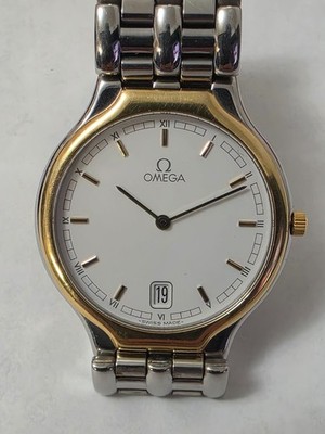 VINTAGE OMEGA DE VILLE SYMBOL QUATZ DATE WHITE DIAL 18K