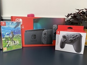 Nintendo Switch Grau Konsole (verbesserter Akku) mit Pro Controller und Zelda BoTW