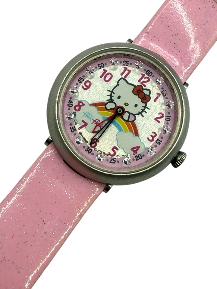 Reloj antiaéreo Sanrio Hello Kitty On Rainbow Flik correa rosa suiza batería nueva Foto 3 de 4