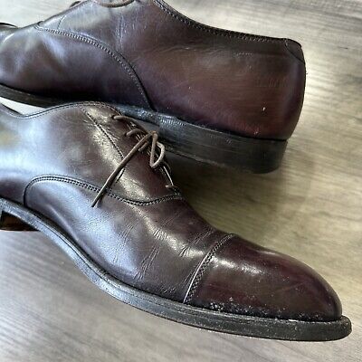 Alden 906 Straight Tip Bal is built on the Hampton last. The model has a burgundy Calfskin leather upper with a single leather outsole.