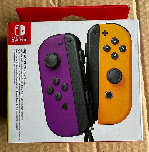 NINTENDO Switch Joy-Con Wireless Controllers - Purple & Orange - NEW OFFICIAL - 第 1/2 張圖片