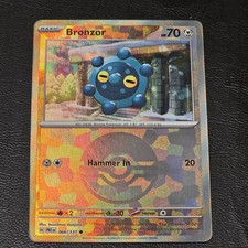 Bronzor (Poke Ball Pattern) 066/131 Sv: Prismatic Evolutions Holo