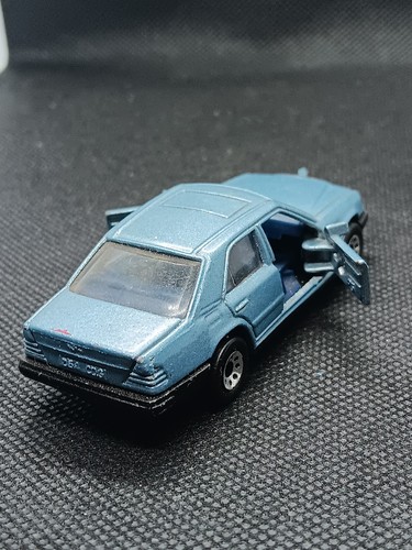 1986 Matchbox MB-31 Mercedes-Benz 300E 300-E W124 Sedan Light Blue 1:61 Scale  - Picture 6 of 7