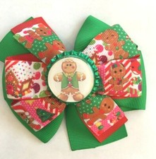 Beautiful Christmas Gingerbread Family inspired hair bow for girls.