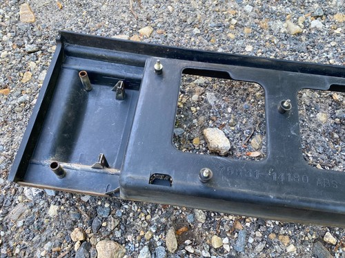 1984 1985 Toyota Celica RA64 exterior trim light license plate holder bezel oem - Imagen 15 de 17