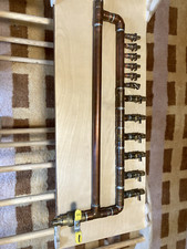 1" Copper loop manifold Uponor brass ProPEX 6 x 1/2" outlets, 6 x 3/4" outlets