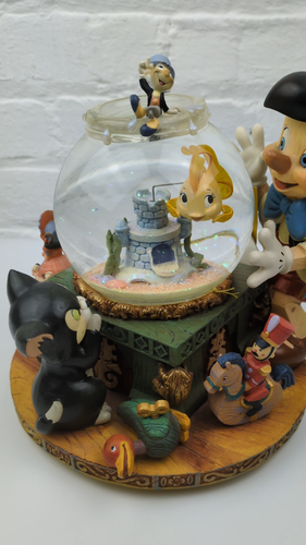 Raro mappamondo musicale di neve Disney Store Pinocchio "Toyland" - vintage da collezione - Video 1 di 1