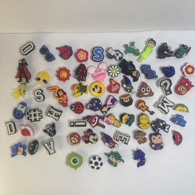 Lot Of 64 Jibbitz Crock Charms Spider Man Minnie Cars Bat Man  Mario Lego