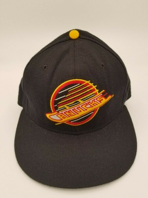canucks new era hat