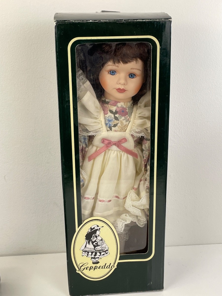 Vintage Geppeddo Porcelain Doll Dark Brown Hair Blue Eyes 16
