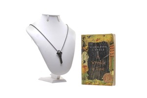 The-Passage-Amy-Bellafonte-Saniyya-Sidney-Screen-Used-Book-amp-Necklace
