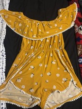 Off The Shoulder Yellow Daisy Ruffle Cottagecore Romper And A Cinched Waist