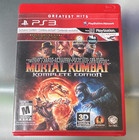 PS3 Mortal Kombat Komplete Edition Greatest Hits case with fiery Scorpion and Sub-Zero artwork, Warner Bros. logo, and ESRB M rating.