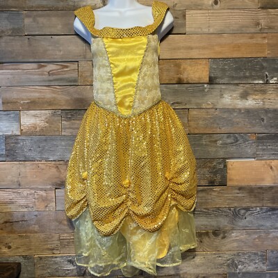 is belle's dress yellow or gold I had this idea that we see Belle in so many colors during the film however her most associated colors are gold and blue, I wanted her to have a proper dress