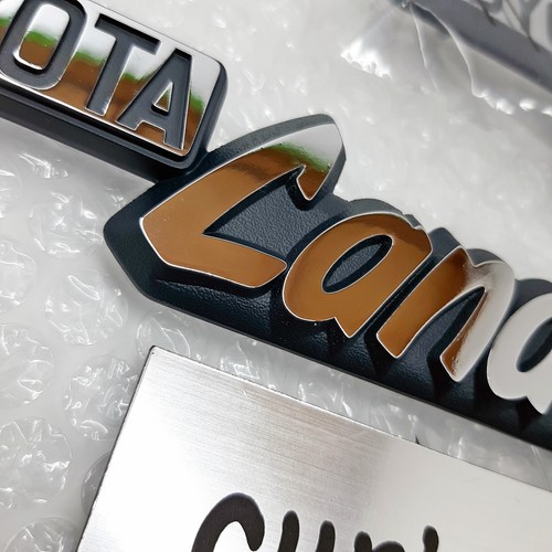 Juego emblema guardabarros TOYOTA OEM Land Cruiser 74-81 FJ40 BJ40 nuevo 75343-90351 x2 - Imagen 13 de 14
