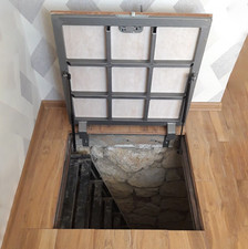 Custom interior hatch door covered with laminate floor Cellar basement trapdoor