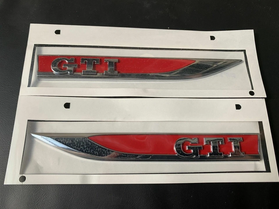~Neu Original VW GTI Satz Schriftzug für den Kotflügel links & rechts ~ - Bild 1 von 1