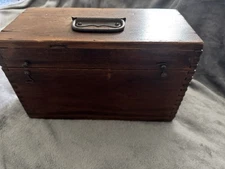 Vintage Transit Level in original wooden box with surveyor’s staff.