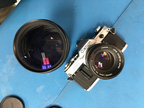 Canon AE-1 35mm SLR Film Camera w/ multiple lense and flash - Picture 3 of 6