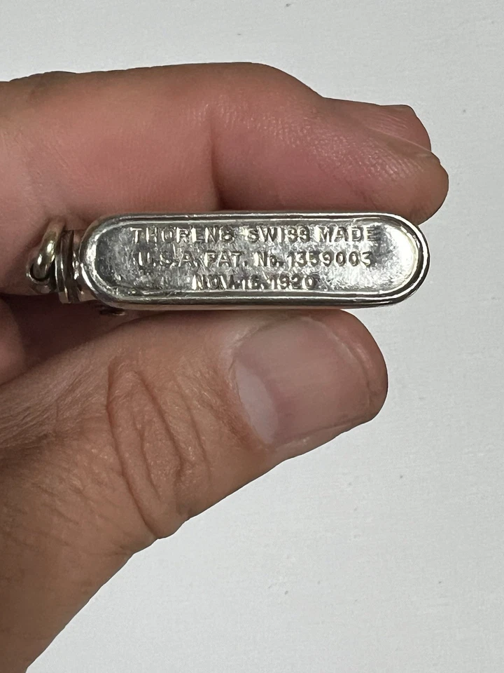 Encendedor Thorens vintage hecho en Suiza con patrón cromado de una sola garra Foto 2 de 4