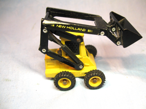 Ertl • New Holland Kompaktlader L555 1/64 Die-Cast - Bild 3 von 13