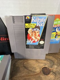 Lot of 7 Nintendo NES Games RAMBO Wrestle Mania Hulk Hogan Blades Of Steel &more