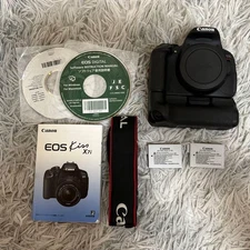 Canon EOS Kiss X7i Digital SLR Camera with Battery Grip and Accessories