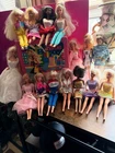 lot of 90s vintage barbie dolls whit clothes and case