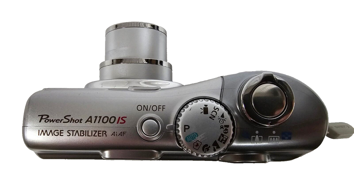 Working Canon PowerShot A1100 IS 12.1MP Silver Digital Camera 4x