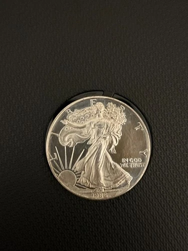 1986 proof SILVER EAGLE Coin - 1oz silver - 1st year of issue - rubbed & dull