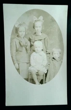 Vintage 1920s Real Photo Postcard of Four Children by AZO Publisher