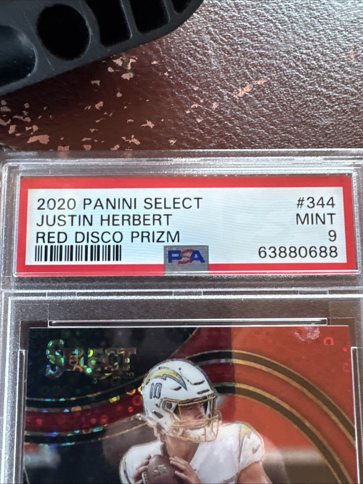 2020 Panini Select - Field Level Justin Herbert #344 Red Disco Prizm  21/49 (RC)