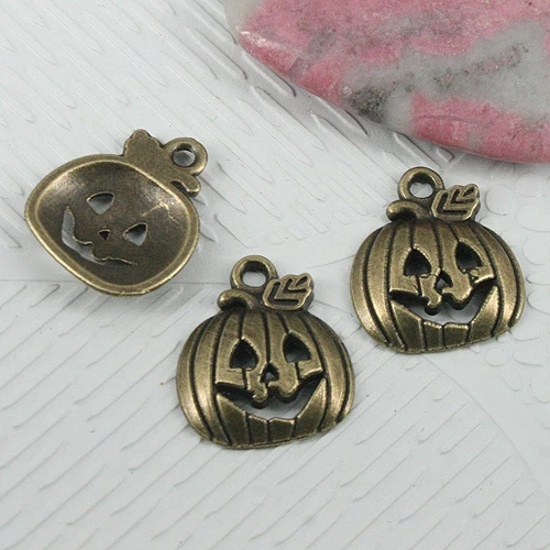 14pcs antiqued bronze color pumkin faced charms EF0621 - Image 1 of 1