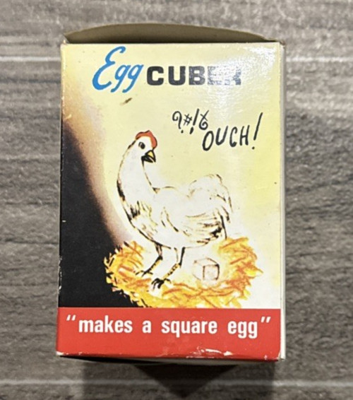 A 1977 gadget that turns a regular egg into a perfect cube — still one of the most delightfully absurd kitchen contraptions ever made.