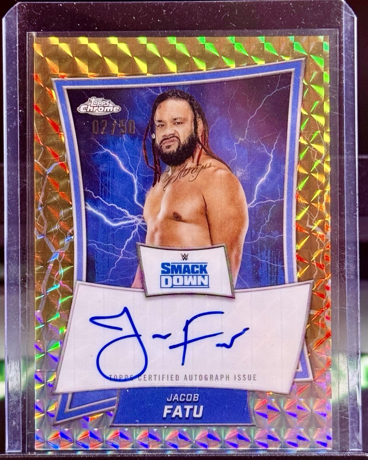 2025 Topps Chrome WWE Jacob Fatu Blue Brand Auto Gold Geometric Refractor /50