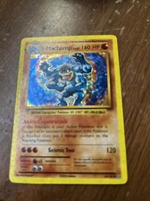 Machamp 59/108 Evolutions Holo