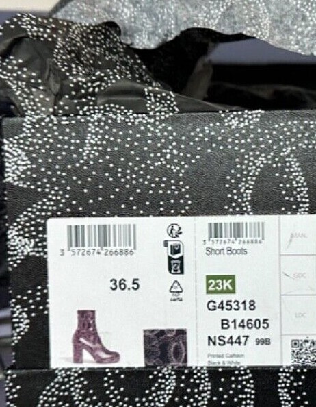 New 23K Chanel CC Black White Camellia Platform Short Boots New 23K Chanel CC Black White Camellia Platform Short Boots